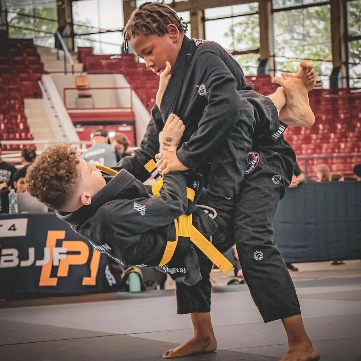 Young athlete competing at IBJJF